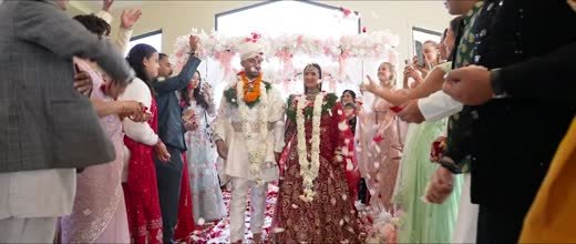 Rose petals thrown over the couple as they leave the ceremony